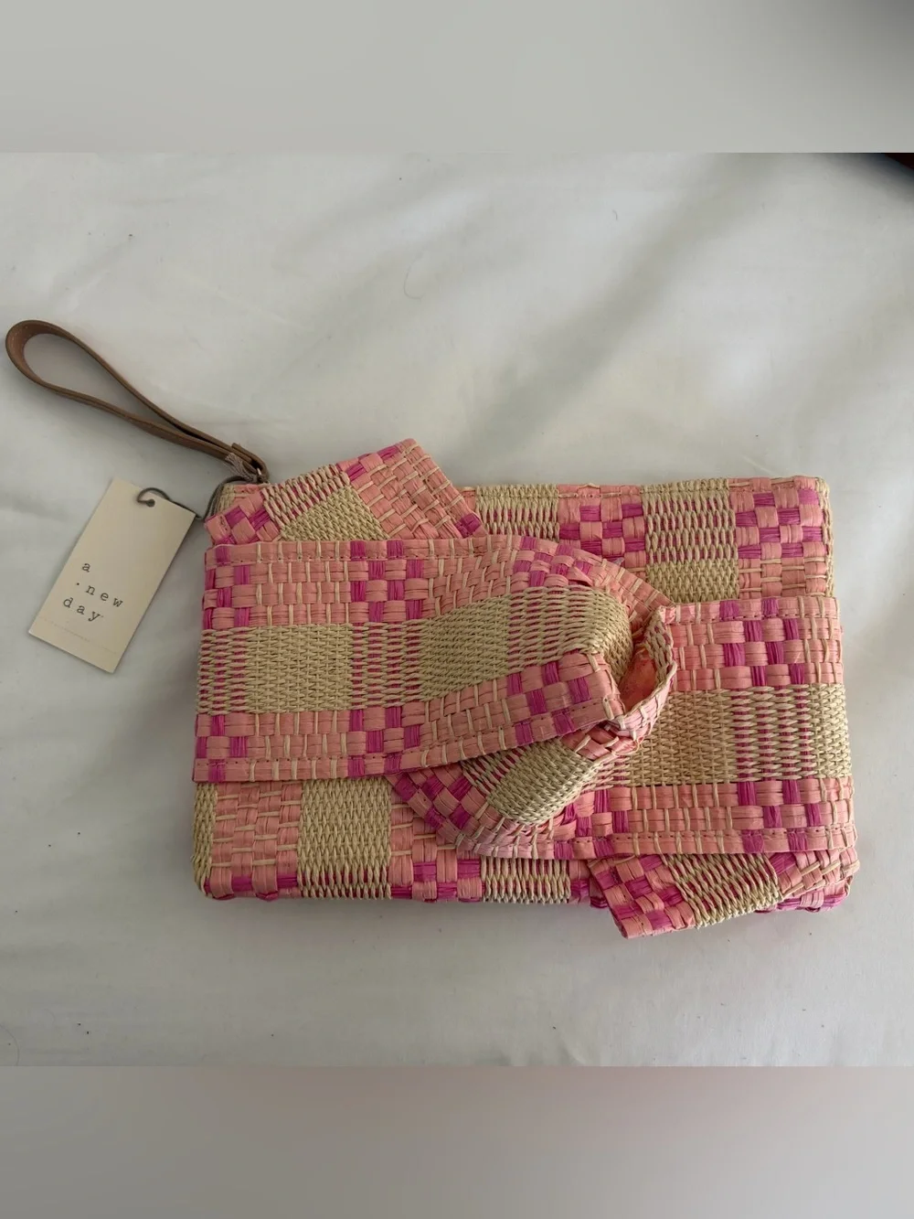 a new day Pink & Natural Woven Clutch with Knot Detail